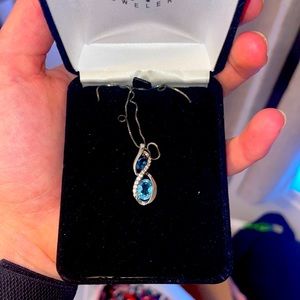 Beautiful Kay Jewelers Blue/Silver infinity necklace worn once. Diamonds.